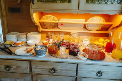 a dining room with a table and a window at Garni Cir in Santa Cristina in Val Gardena