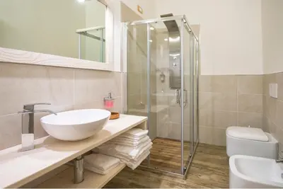 a bathroom with a sink and a shower at Rifugio Sores Adventure in Coredo