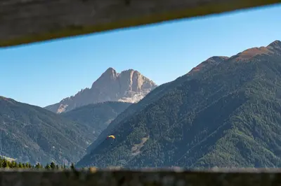 a view of a mountain range with a mountain at Pension Rastnerhof in Luson