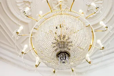 a chandelier hanging from a ceiling at Grand Hotel Bellevue - adults only in Merano