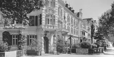 a black and white photo of a large building at Grand Hotel Bellevue - adults only in Merano