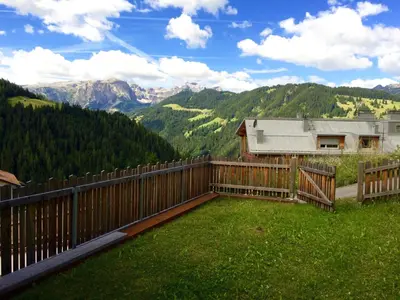 a balcony with a view of the mountains at Apartments Ingrid in La Valle