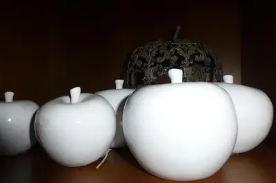 a group of white apple lights on a table at B&B Tamarindo in La Villa