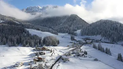 a ski resort in the snow on a mountain at Garni Hotel Rosengarten B&B in Selva di Val Gardena