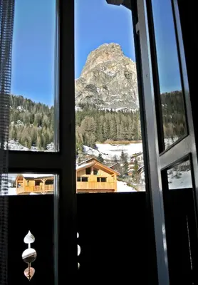 a view of a mountain from a train window at Garni Gabrieli in Corvara in Badia