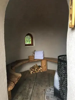 a room with a bath tub with a window at Apartment Plan Corones in Brunico