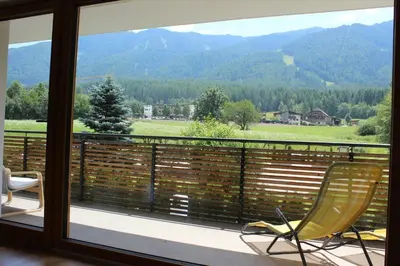 a balcony with a view of a mountain at Apartment Plan Corones in Brunico