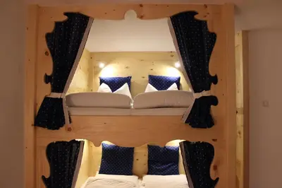 a bunk bed with two beds in a room at Apartment Plan Corones in Brunico
