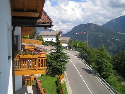 a balcony with a view of a road and mountains at B&B L'Arca di Noè in Laion