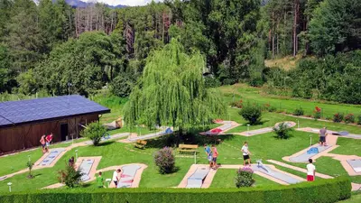 an aerial view of a park with people in the grass at Hotel Flötscherhof in Naz-Sciaves