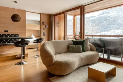a living room with a couch and a table at Gran Tubla in Ortisei