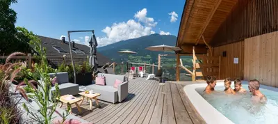 a group of people in a swimming pool at Widmannhof - Urlaub auf dem Biobauernhof in Bressanone
