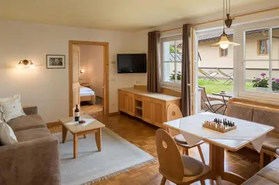 a living room with a couch and a table at Residence Diamant in Castelrotto