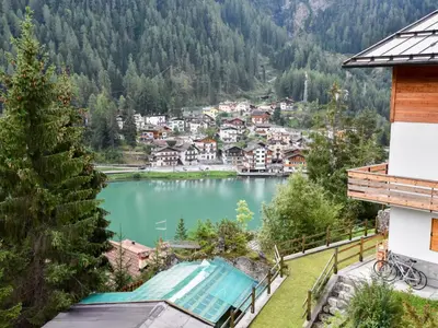a view from a balcony of a ski resort in the mountains at Apartment La Busa-3 by Interhome in Alleghe