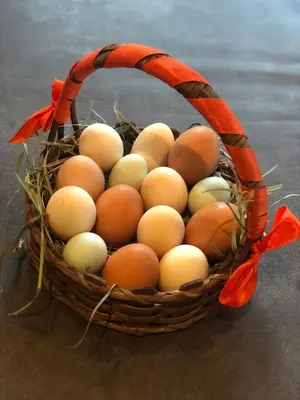 a basket of eggs sitting on a table at THALERHOF Onach Dolomites - Kronplatz in San Lorenzo di Sebato