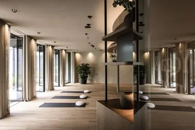 a hallway with a lot of windows and plants at Farmhouse Torgglerhof in Saltusio