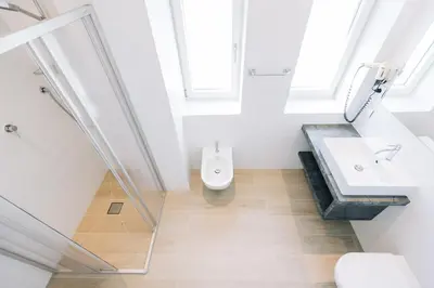 a bathroom with a sink and a toilet at Residence Martinelli in Laives