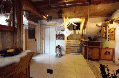 a large room with a lobby with a room with at Hotel Fonte Dei Veli in Panchia