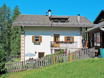 a village in a valley with mountains in the background at Apartment Mastle by Interhome in Ortisei