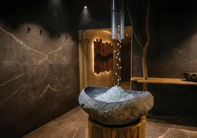 a bathroom with a shower and a sink and a toilet at Hotel Resort Veronza in Cavalese