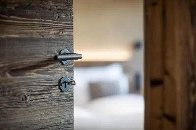 a close up of a door with a key at Kräutererbe Bacherhof in Nalles