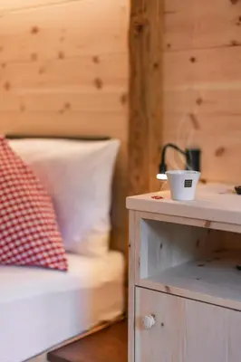 a group of towels sitting in a sauna at Hotel Appartement Haus Gitschberg in Vandoies