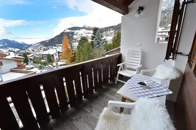 a balcony with a view of the mountains at Apartment Nogler Frieda in Selva di Val Gardena