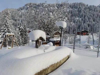 a heap of snow on top of a bed at Chalet Dumbria Dolomites in Selva di Val Gardena
