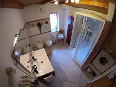 an overhead view of a bathroom with a shower and a sink at Casa Aurora -Altopiano di Pinè in Bedollo
