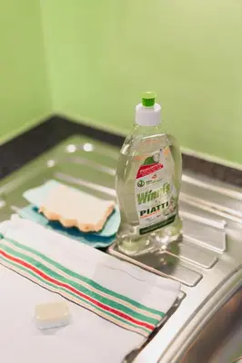 a bottle of virgin laundry sitting on top of a sink at Villa Floris in Bressanone
