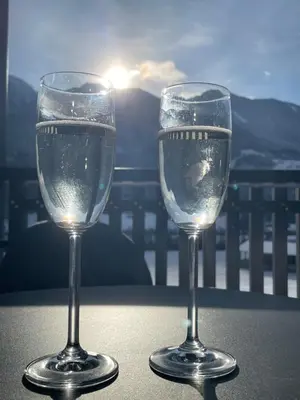 two glasses of water sitting on a table at Hotel Larch in Campo di Trens