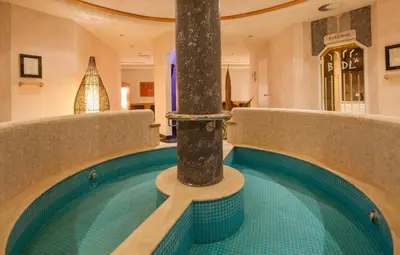 a swimming pool in a house with a swimming pool at DAS BADL - Smart Retreat AO in Caldaro