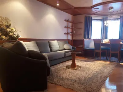 a living room with a couch and a table at Dreaming Ortisei in Ortisei