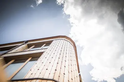 a tall building with the sky in the background at Hirben Naturlaub in Villabassa