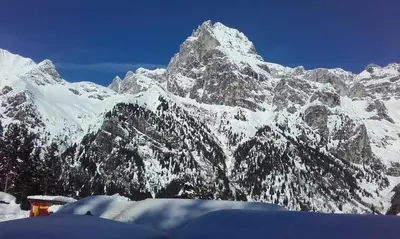 a snow covered mountain with a snow covered mountain at Bacherhof in Val di Vizze