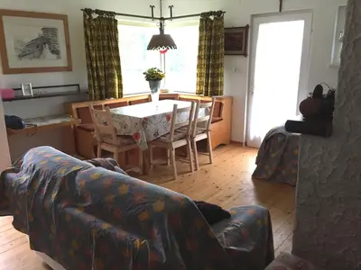 a living room with a couch and a fireplace at Bellamonte Mar in Bellamonte
