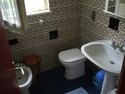 a kitchen with a sink and a dishwasher at Bellamonte Mar in Bellamonte