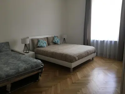 a bedroom with a bed and a window at Appartamento Nadia in Merano