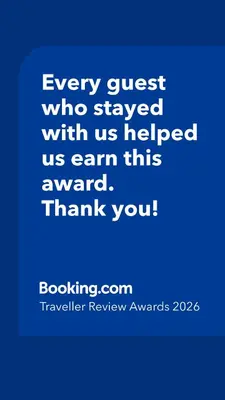 a blue picture with the words every guest who stayed with us helped us earn this at Residence Des Alpes in Canazei