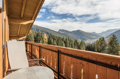 a balcony with a view of the mountains at Villa Scherlin in Ortisei