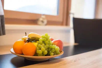 a bowl of fruit on top of a table at Saxlhof in Stanghe