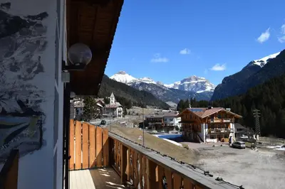 a view from a balcony of a ski resort at Hotel Vajolet in Mazzin