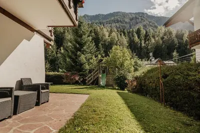 a patio with a view of the mountains at Apartments Thaler Irina in Ortisei