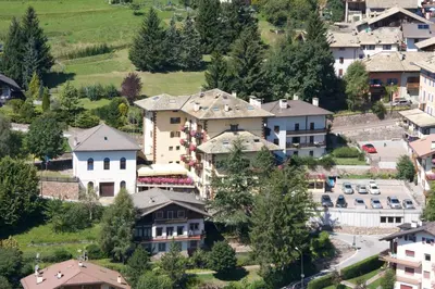 an aerial view of a town with houses at Hotel Corona in Carano