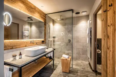 a bathroom with a sink and a shower at My Arbor - Dolomites in Bressanone
