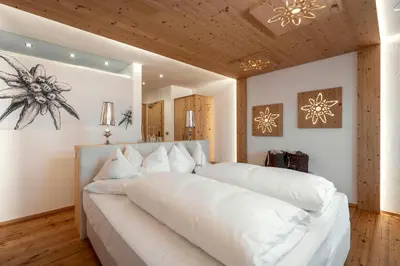 a rendering of a small apartment floor plan at Hotel Hubertus in Valdaora
