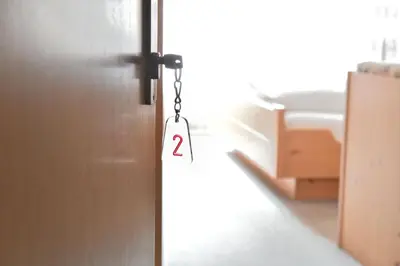 a door chain with the number two hanging from it at Schönblick OHG des Daum Tobias in Aldino