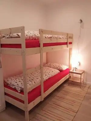 a bedroom with two bunk beds in a room at Villa Wally in Merano