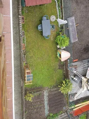 an aerial view of a yard with a toy house at Casa Bedovina in Predazzo