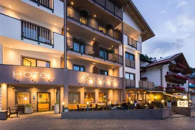a hotel with a sign that reads russian hotel at Rösslwirt in Barbiano